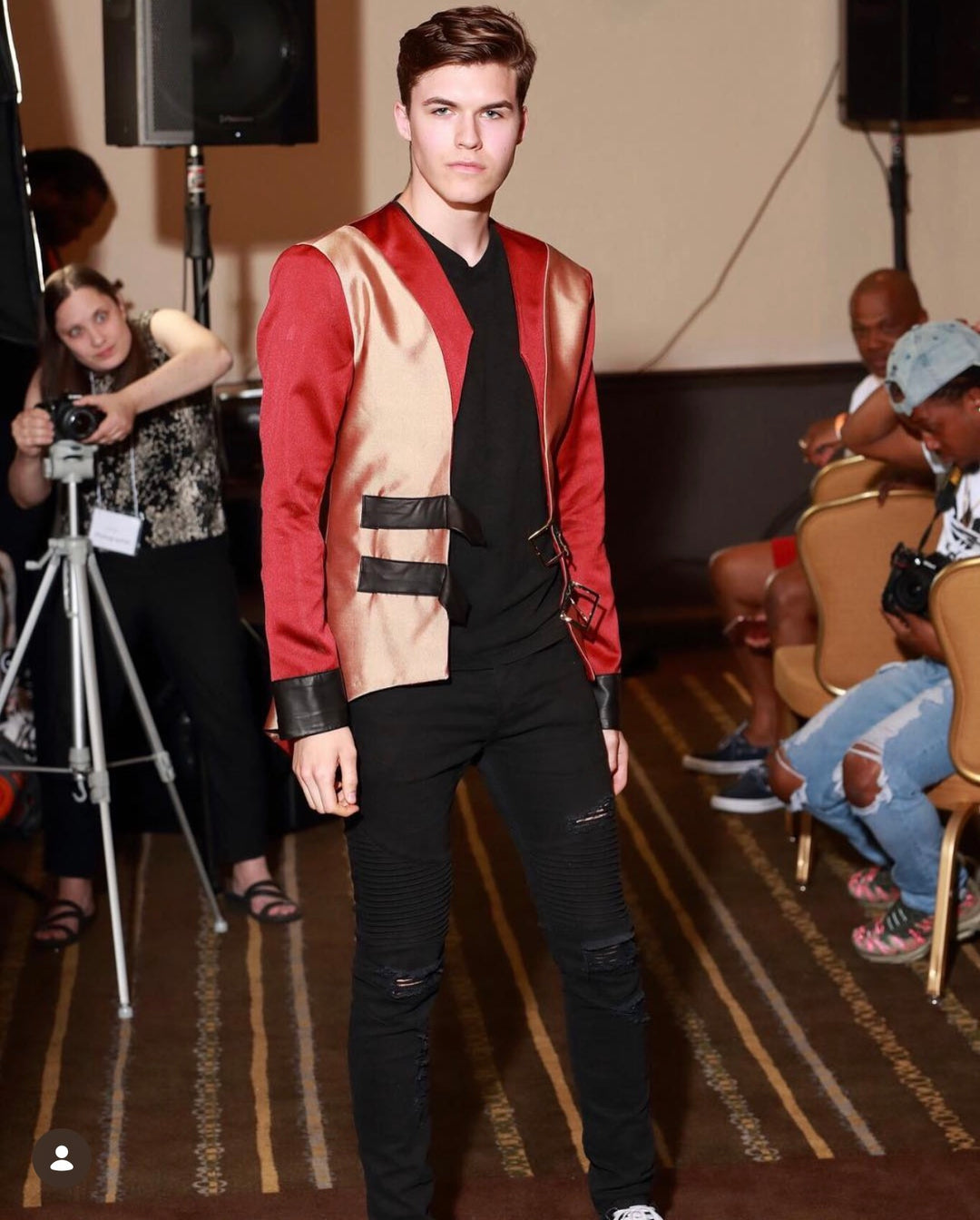 Man wearing Majesty 22 red and gold cutting edge blazer