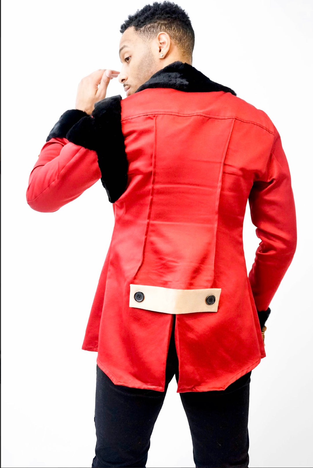 Man wearing Majesty 22 red and black fur jacket