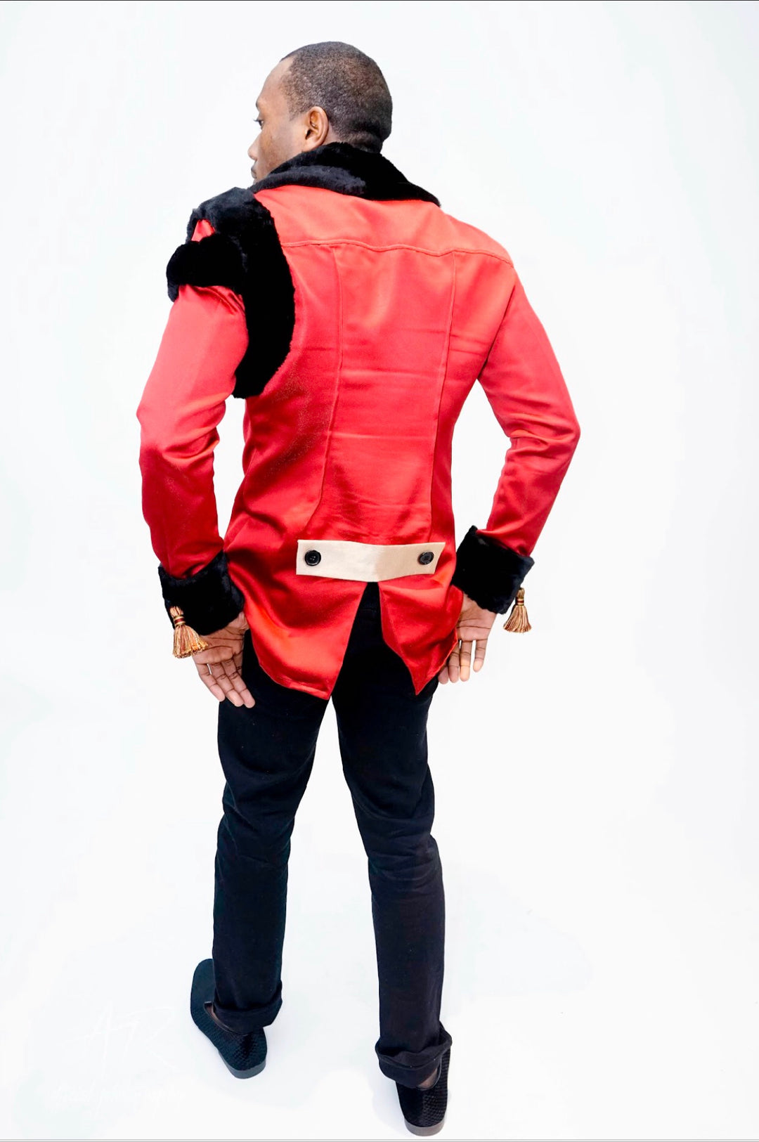 Man wearing Majesty 22 red and black fur jacket