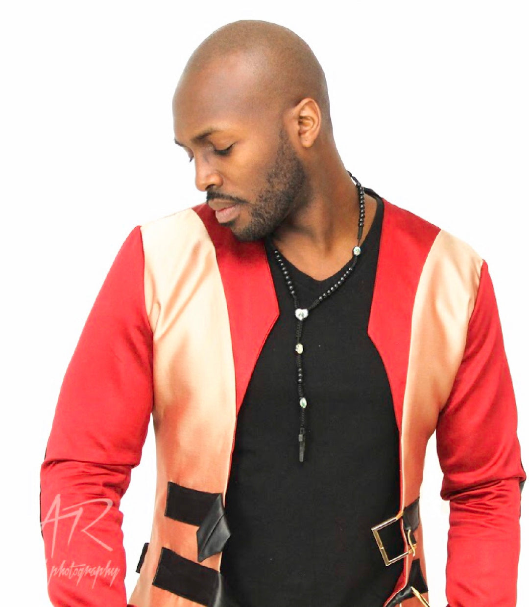 Man wearing Majesty 22 red and gold cutting edge blazer